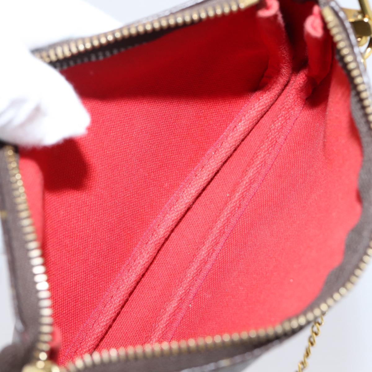 LOUIS VUITTON Monogram Vivienne Mini Pochette Accessoires M69976 Auth BA16597SAM