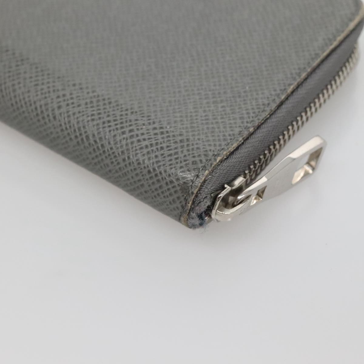 LOUIS VUITTON Taiga Zippy Wallet Vertical Gray Gracie M32601 LV Auth bs25700
