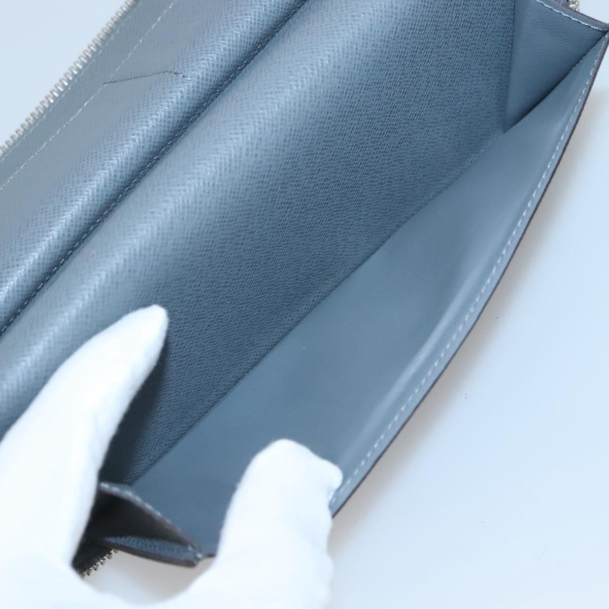 LOUIS VUITTON Taiga Zippy Wallet Vertical Gray Gracie M32601 LV Auth bs25700