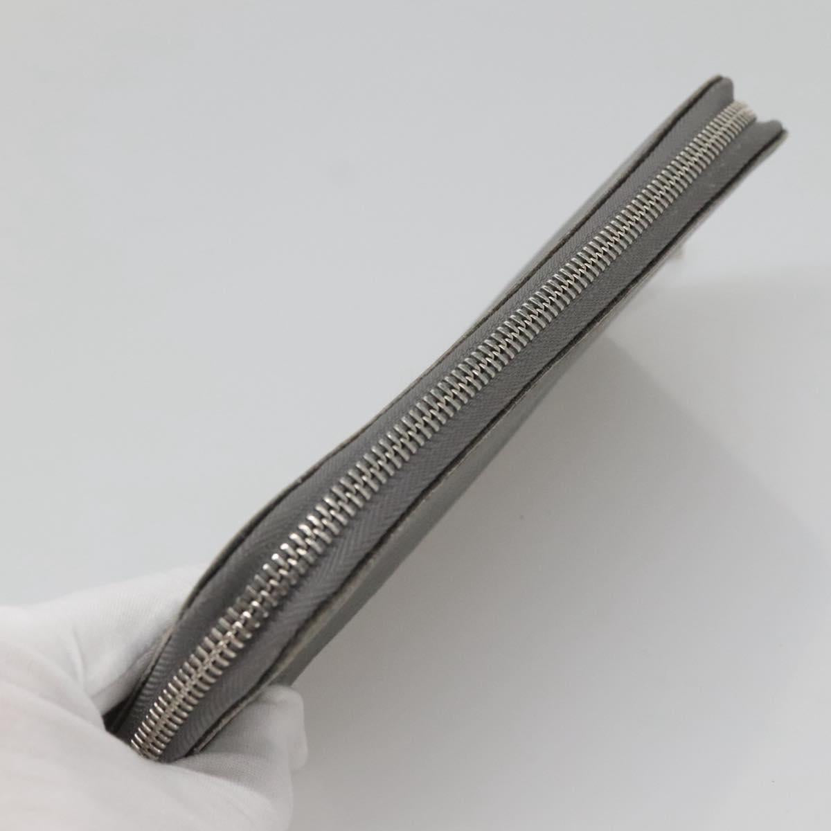 LOUIS VUITTON Taiga Zippy Wallet Vertical Gray Gracie M32601 LV Auth bs25700