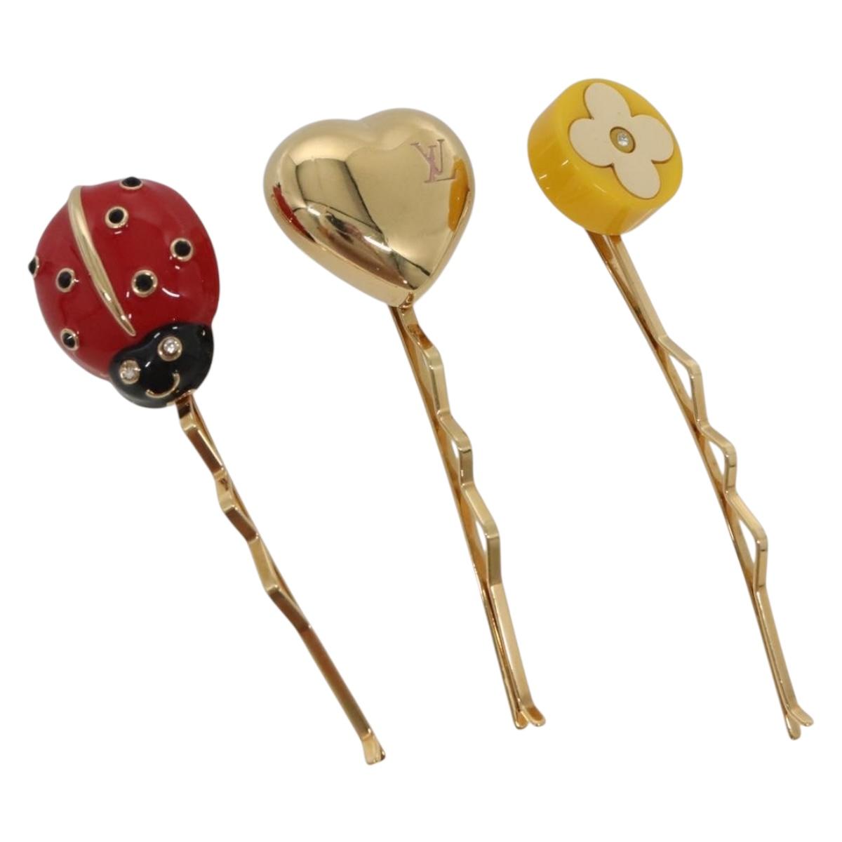 LOUIS VUITTON Kit Bullet Phrases Hair clip metal Gold M92349 LV Auth bs27708