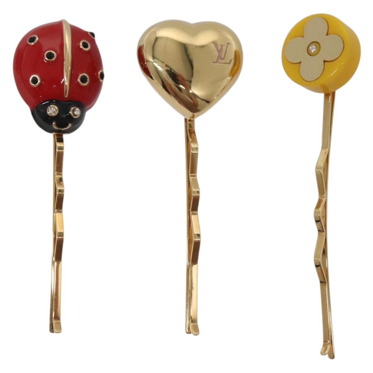 LOUIS VUITTON Kit Bullet Phrases Hair clip metal Gold M92349 LV Auth bs27708