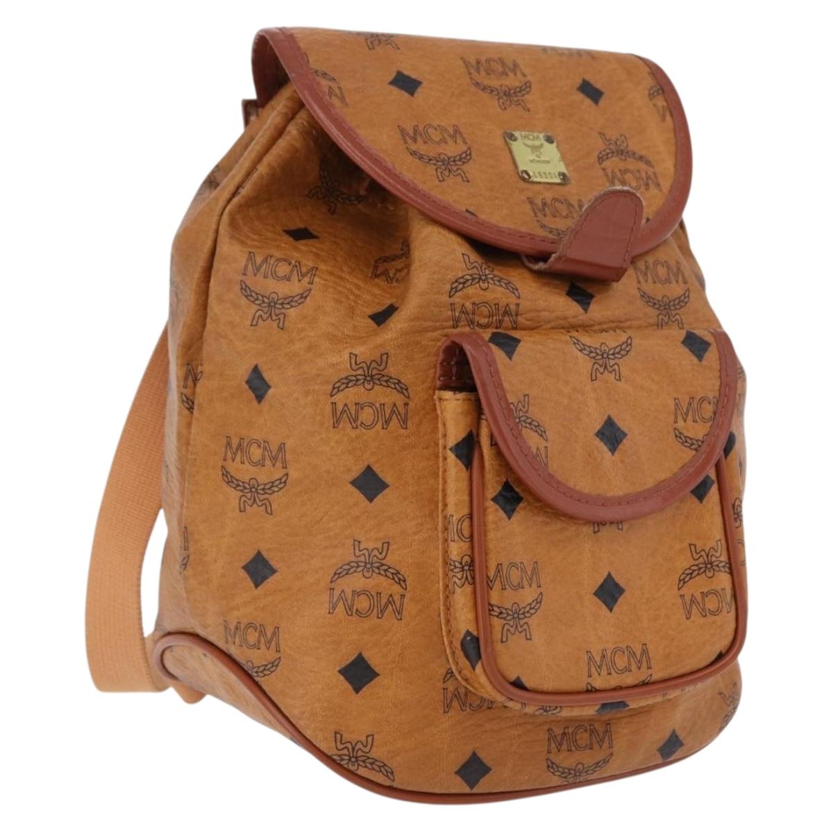 MCM Vicetos Logogram Backpack PVC Beige Gold Auth bs36277