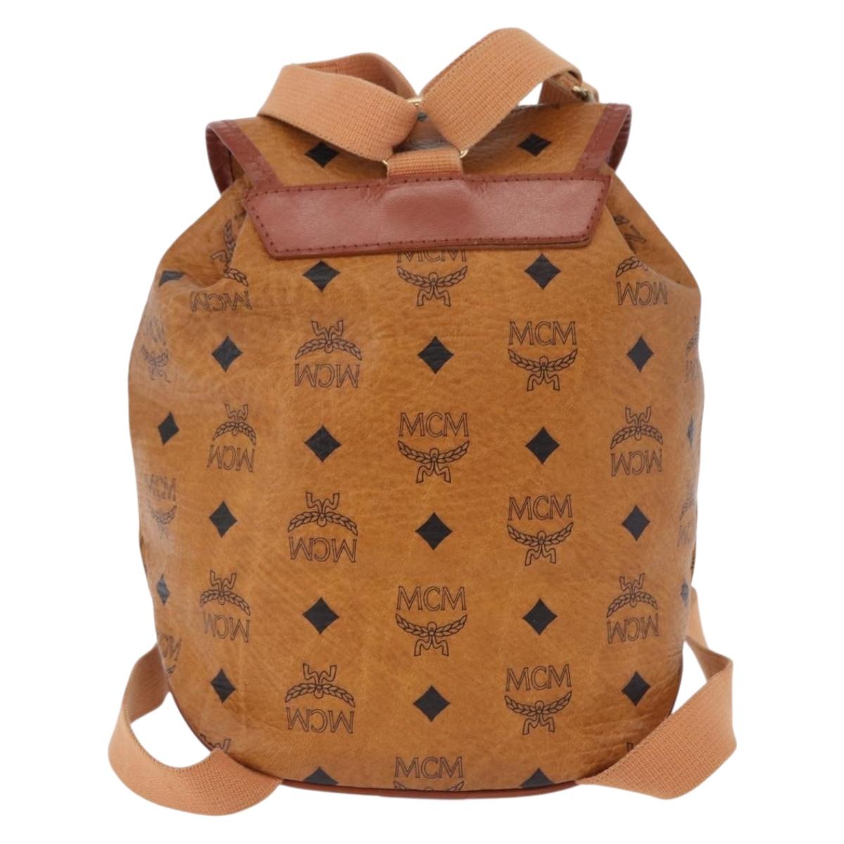 MCM Vicetos Logogram Backpack PVC Beige Gold Auth bs36277