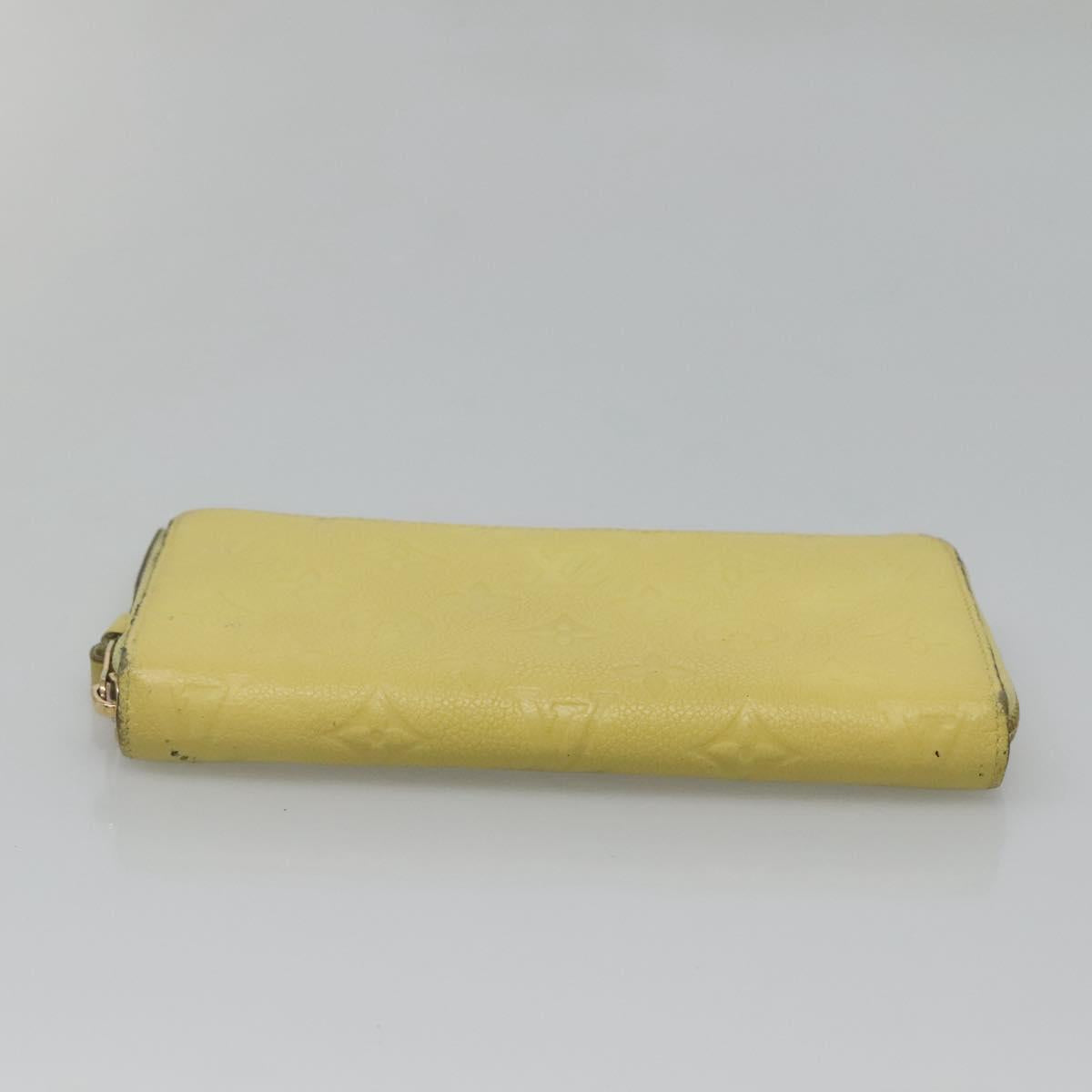 LOUIS VUITTON Monogram Empreinte Zippy Wallet Citrin M60572 LV Auth fm4645