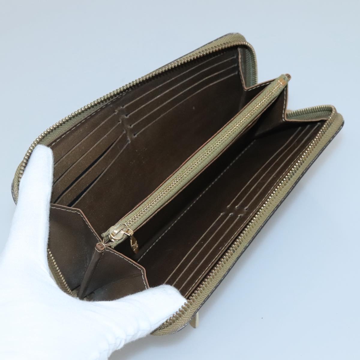 LOUIS VUITTON Suhari Zippy Wallet Leather Bronze M95701 LV Auth fm4650