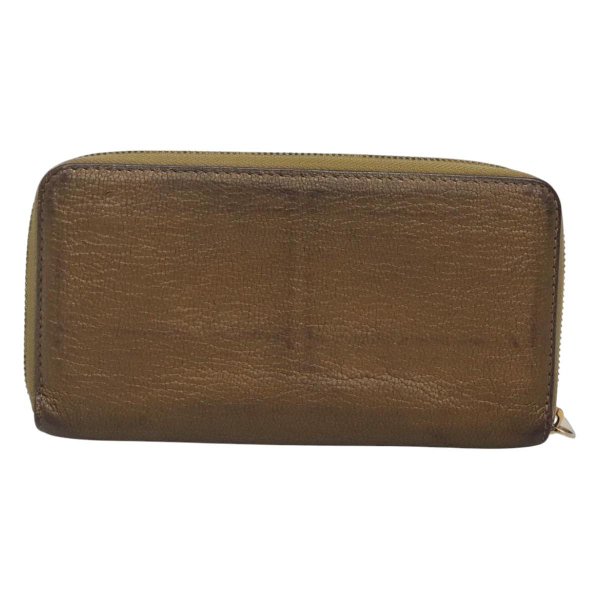 LOUIS VUITTON Suhari Zippy Wallet Leather Bronze M95701 LV Auth fm4650
