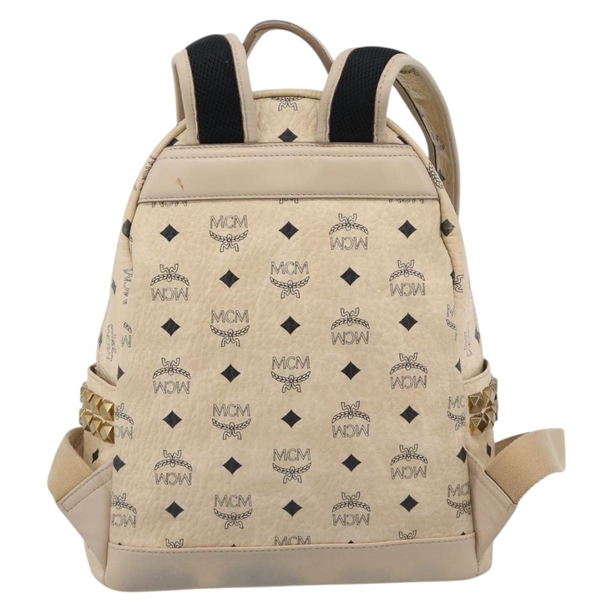 MCM Vicetos Logogram Backpack PVC Beige Gold Auth gh2219