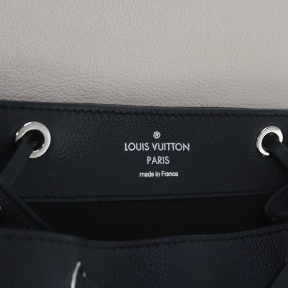 LOUIS VUITTON Lock Me Backpack Calf leather Black White M54108 LV Auth hk1059