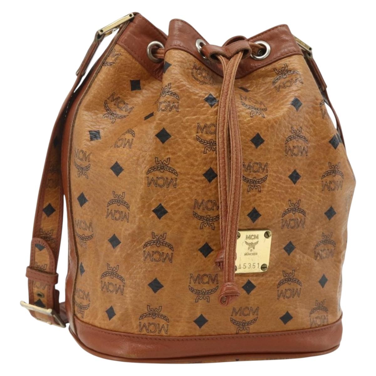 MCM Vicetos Logogram Drawstring Bag Bag PVC Leather Brown Gold Auth ka4224A