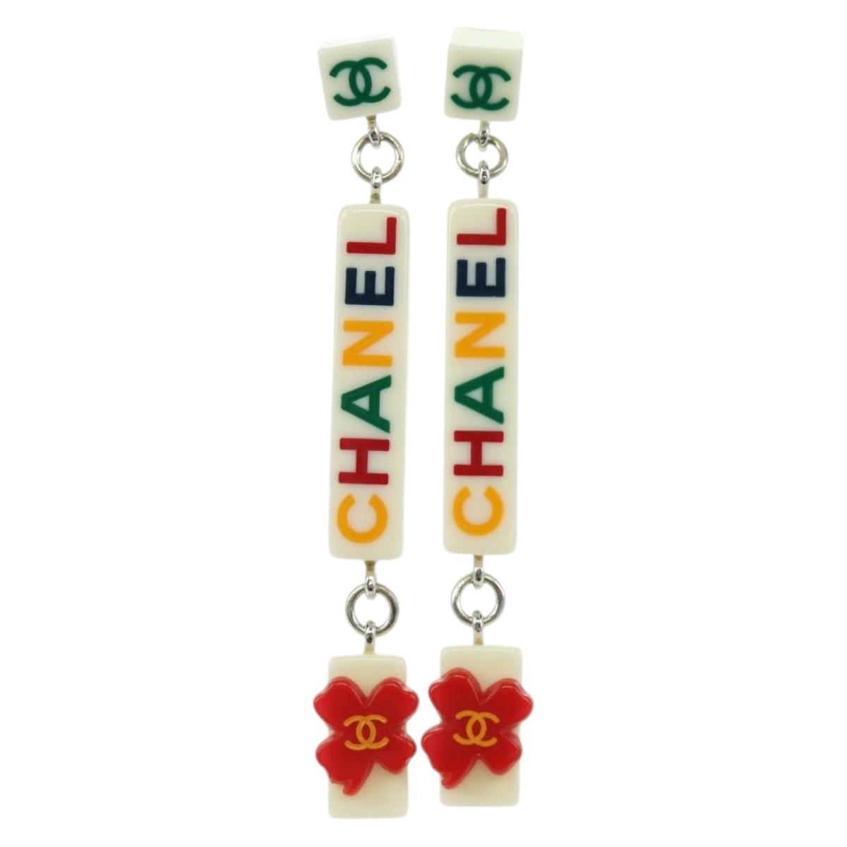 CHANEL COCO Mark Camellia Pierce plastic White CC Auth YKZ574M